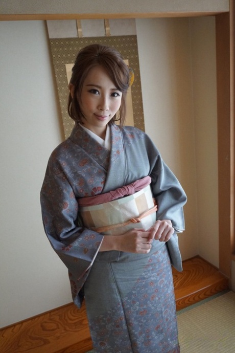 Japanese beauty Aya Kisaki looses her small tits from traditional clothing