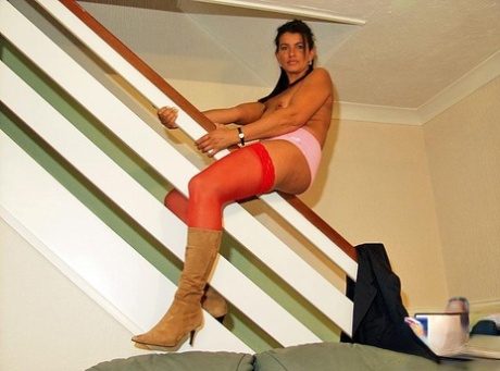 Latina chick gets banged by an old dude wearing red stockings and suede boots