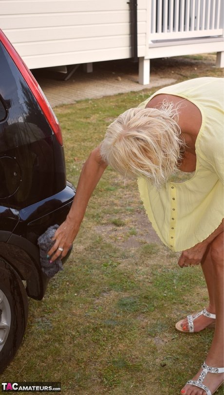 Older blonde Dimonty gets totally naked after washing a vehicle