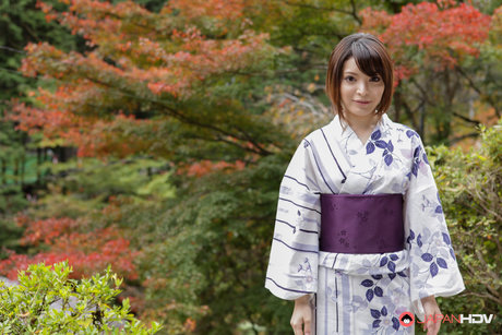 Nice Japanese girl Hikaru Kirishima models traditional clothing while outside