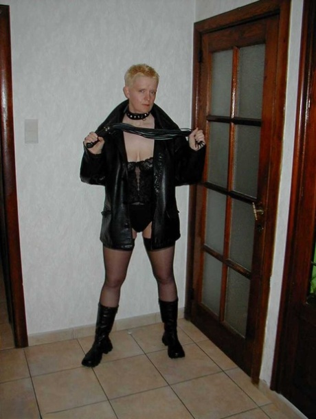 Mature lady Tiffany Pearl goes nude in stockings and black leather boots