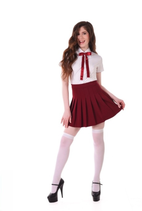 Schoolgirl Hot Pearl strips to over the knee socks before toying her vagina