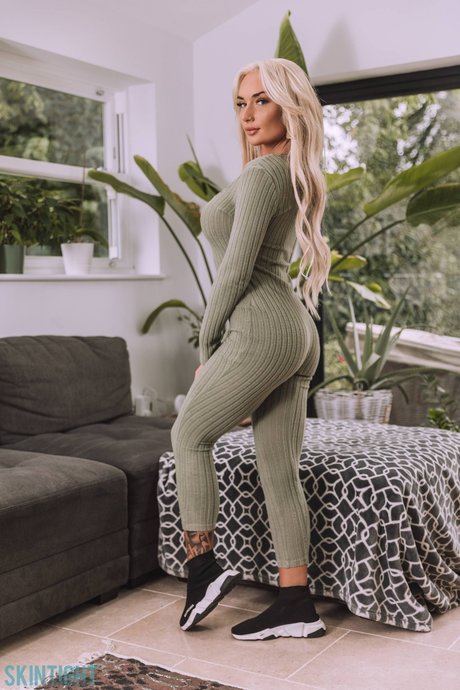 Hot blonde Charlotte Stevens releases her great body from skintight attire