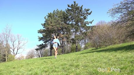 Solo girl Shalina Shine takes a piss while traversing the countryside