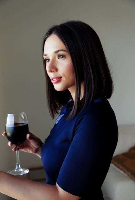 Gorgeous brunette teen Eve Sweet gets totally naked over a glass of wine