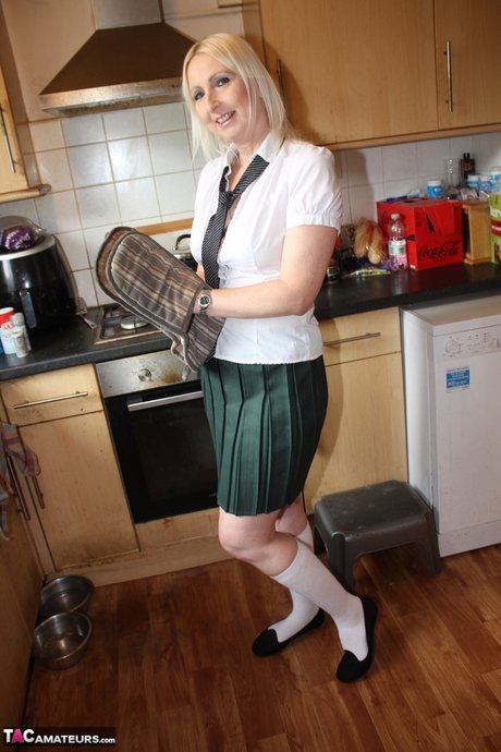 Middle-aged UK blonde Tracey Lain has POV sex in schoolgirl clothing