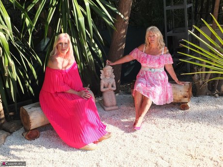 Older blonde pumpers Melody and Randy Raz flashed their panties while outdoors