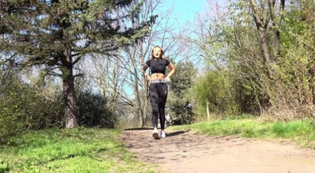 Blonde girl Alexa takes a badly needed piss on a well-traveled path