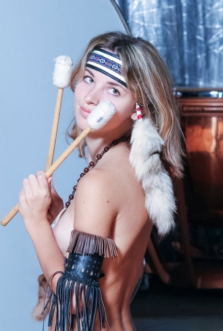 Charming blonde teen Natalia B bangs on the drums while naked