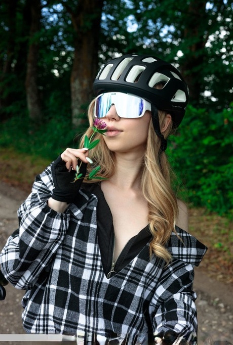 Blonde teen Mirka gets totally naked while out for a bike ride