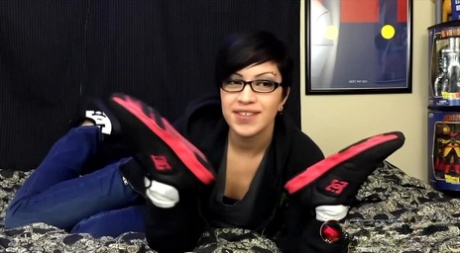 Latina MILF Cassandra Cain holds her stinky sneakers while fully clothed