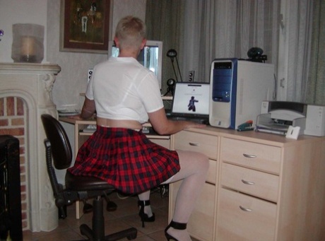 Old woman Tiffany Pearl partakes in upskirt play while dressed as a schoolgirl