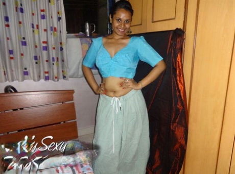 Indian solo girl Lily Singh exposes her naked breasts in a skirt