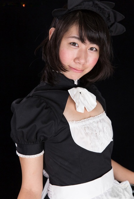 Japanese maid gives a POV handjob while wearing her uniform