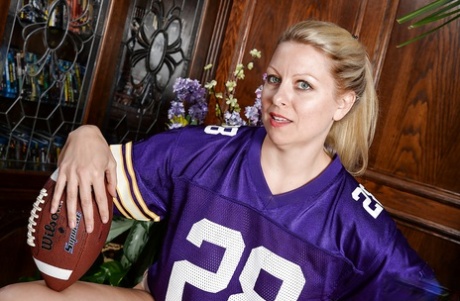 Aged lady Zoey Tyler spreads bald twat after panty and football jersey removal