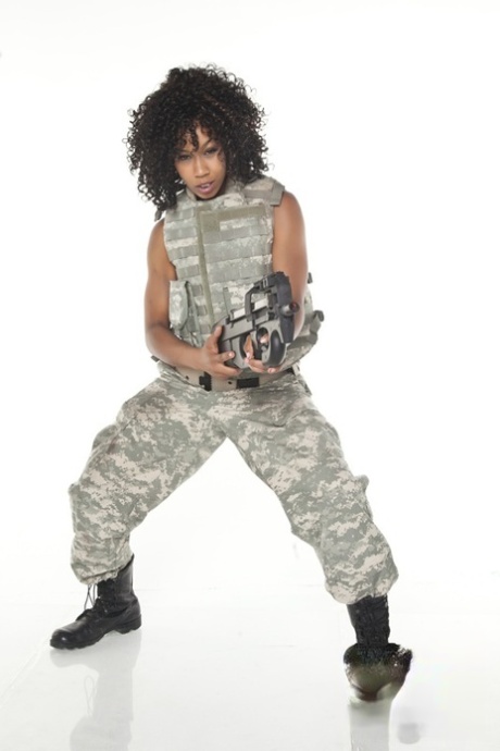 Black girl Misty Stone strips off her uniform to flash pussy