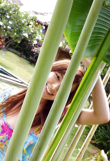 Sweet amateur asian babe Yua Aida showcasing her tempting curves outdoor