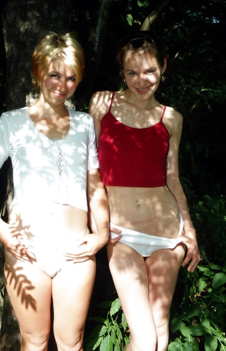 Filthy teenage gals with tiny tits have some lesbian fun outdoor