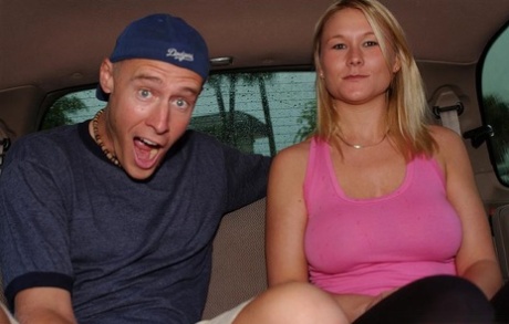 Ample-breasted MILF Juliana Jolene gives a slurpy blowjob in the car
