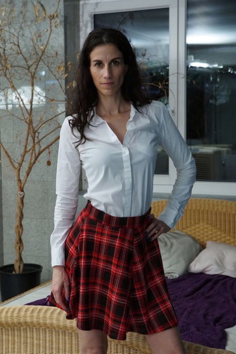 Inked Czech MILF Ali Bordeaux strips off her schoolgirl outfit & masturbates