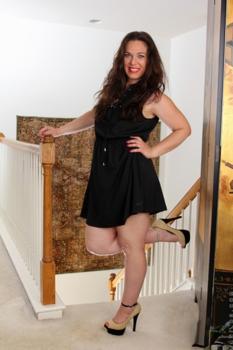 Chubby amateur MILF Katrina Sobar doffs her dress and lingerie and poses