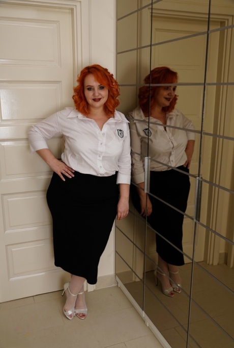 Redheaded MILF Katrin Porto & blonde teen Selvaggia pose seductively