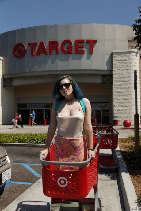 Naughty brunette teen Skylar Anke exposes herself at shopping outlets