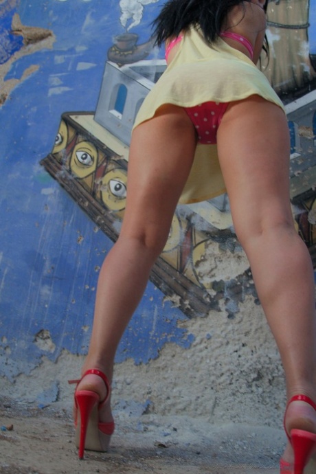 Delightful hairy brunette Angelica Snow romps naked in abandoned building