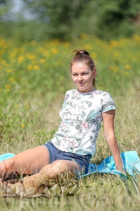 Shameless Slovak teen Mila Fox undresses in nature and masturbates