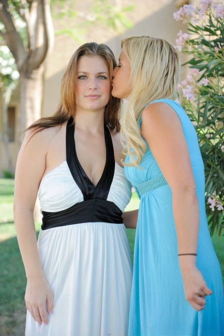 Danielle Delaunay and blonde walk in the fresh air kissing and showing tits