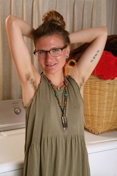 Nerdy chick with hairy legs and pits unveils her beaver on laundry day