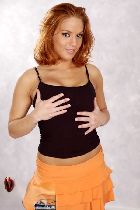Stunning redhead with big juggs Gabriella Banks shows her fellatio skills