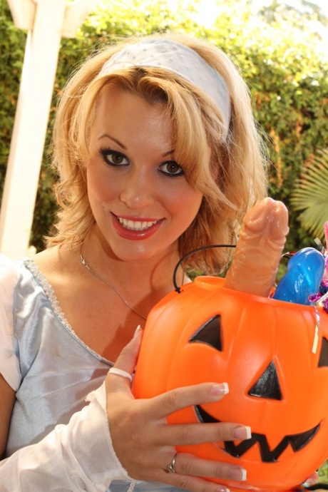 Lusty MILF next door Ashley Sweet comes calling with dildo Halloween treats