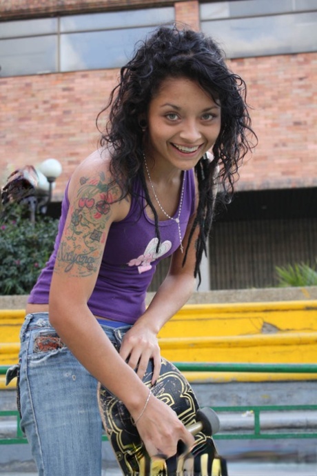 Skinny skater Diana Delgado exposes her cute tattoos on the stairs