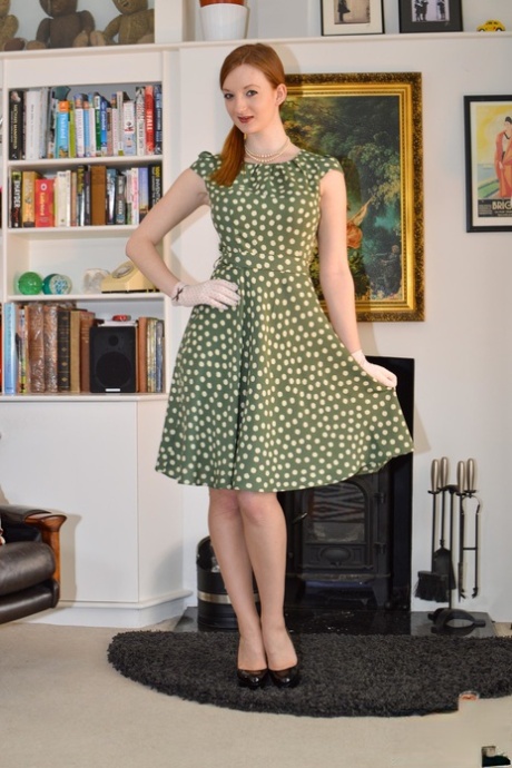 Pale redhead hikes up her summer dress to expose her vintage lingerie