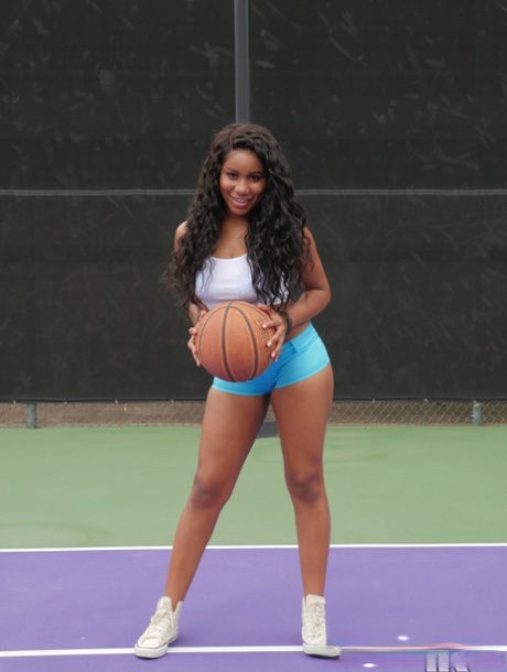 Irresistible young ebony Jenna Foxx frees natural tits on the basketball court