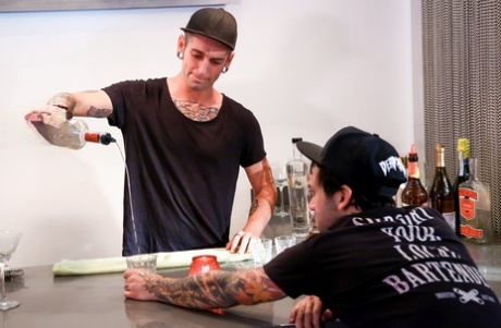 Inked punk girl Felicity Feline gets her tummy tattoo jizzed by the bartender