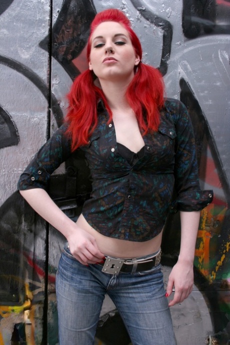 Chick with red twintails takes jeans and black T-shirt off in the alley