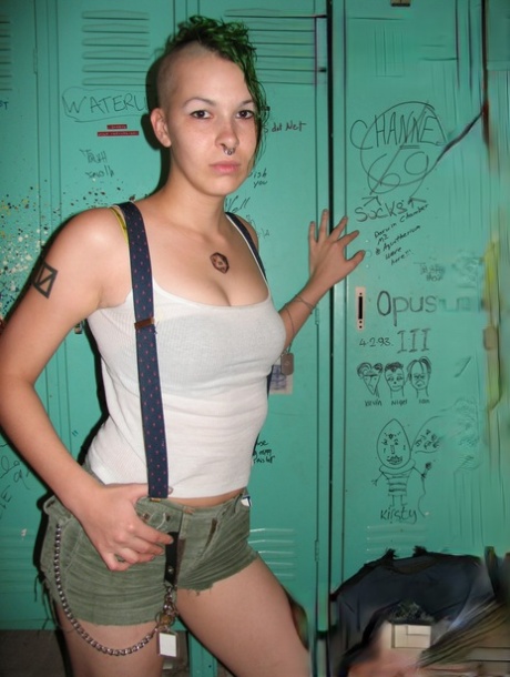 Smoking green haired fetish freak Chapel poses naked in the locker room