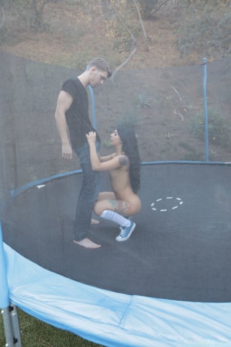 Brazilian teenage nympho Gina Valentina enjoys anal outdoor sex on trampoline