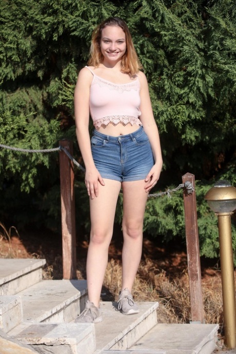 Adorable European teen Lina Lee reveals her sexy body and masturbates outdoors