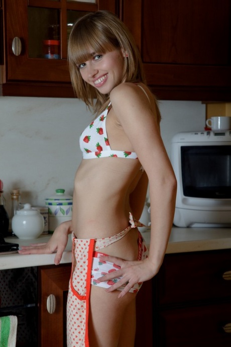 Sweet teen amateur Aina doffs her undies & rides a dildo in the kitchen