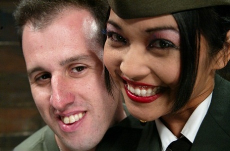 Asian general Mika Tan disciplines a soldier and grabs his dick