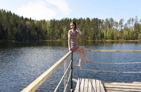 Glamorous teen Pala strips to show her very skinny body by the lake