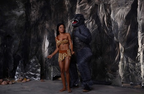 Cavewoman with big tits Anya Ivy flirts with a monster on the movie set