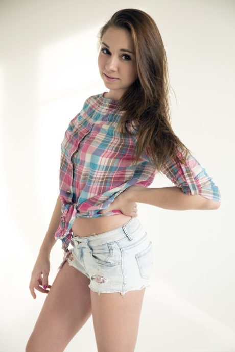 Cute teenage brunette Andys displaying her pink holes up close at the casting