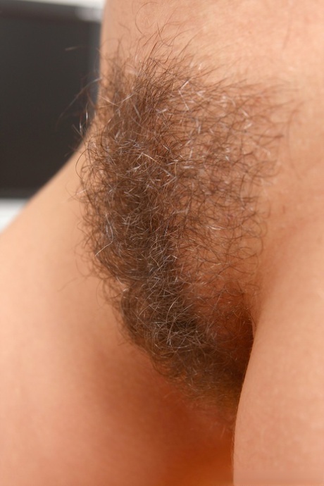Czech babe Victoria Black gets naked & spreads her hairy pussy on the floor