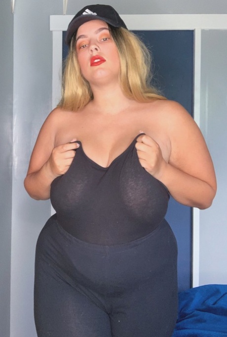 Chubby blonde babe Jordyn khaled shows her huge boobs and poses in nylons