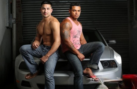 Muscular gay dudes with tattoos fuck hard on a silver sport car