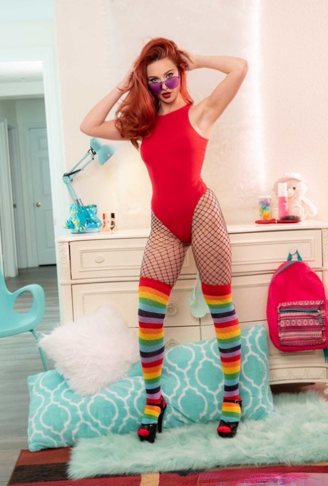 Redhead hottie Lacy Lennon slowly strips bodysuit & poses topless in fishnets